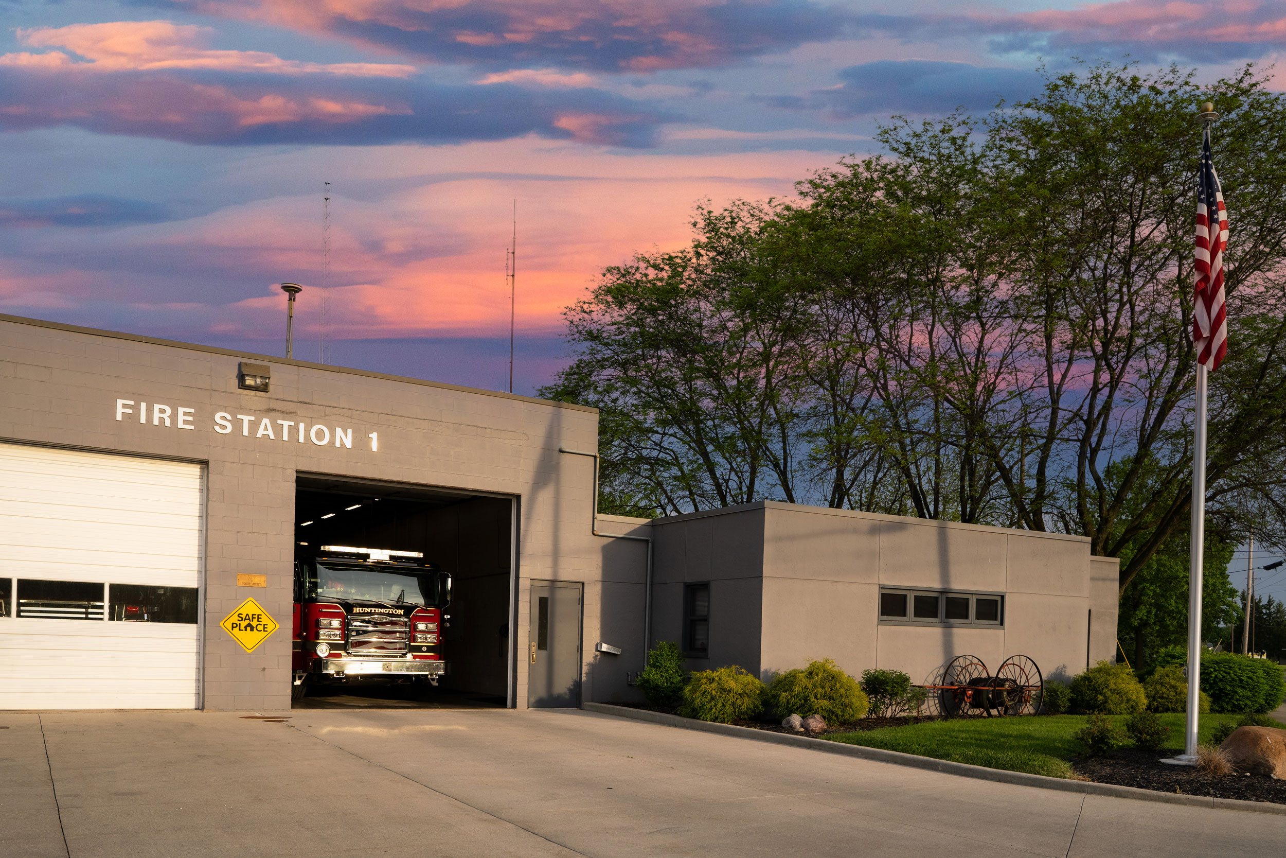 A firetruck parked at a fire station